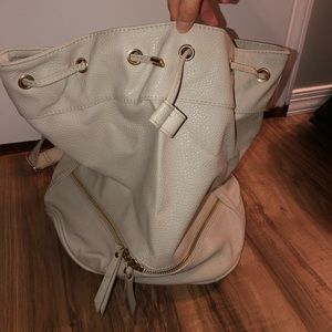 cream colored satchel bag